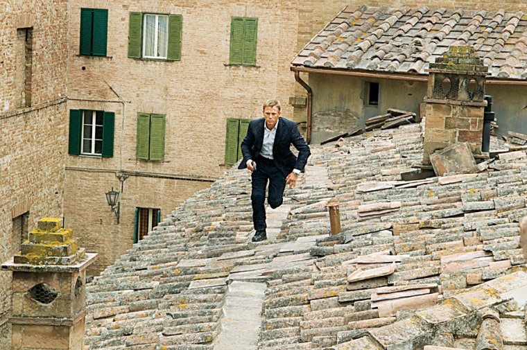 James Bond (Daniel Craig) runs across rooftops in Siena, Italy in "Quantum of Solace".